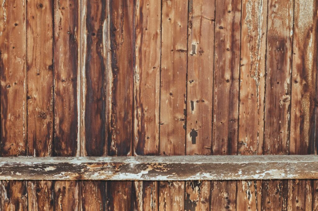 A close up photo of a wooden fence